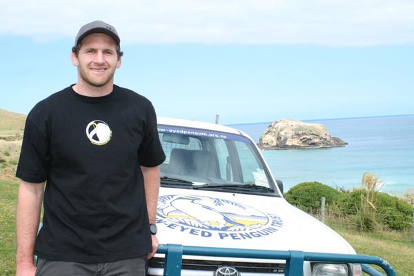 Kieran Read visiting a yellow-eyed penguin reserve on Otago Peninsula